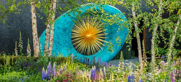 Aeon in its setting in the Chelsea Flower Show garden