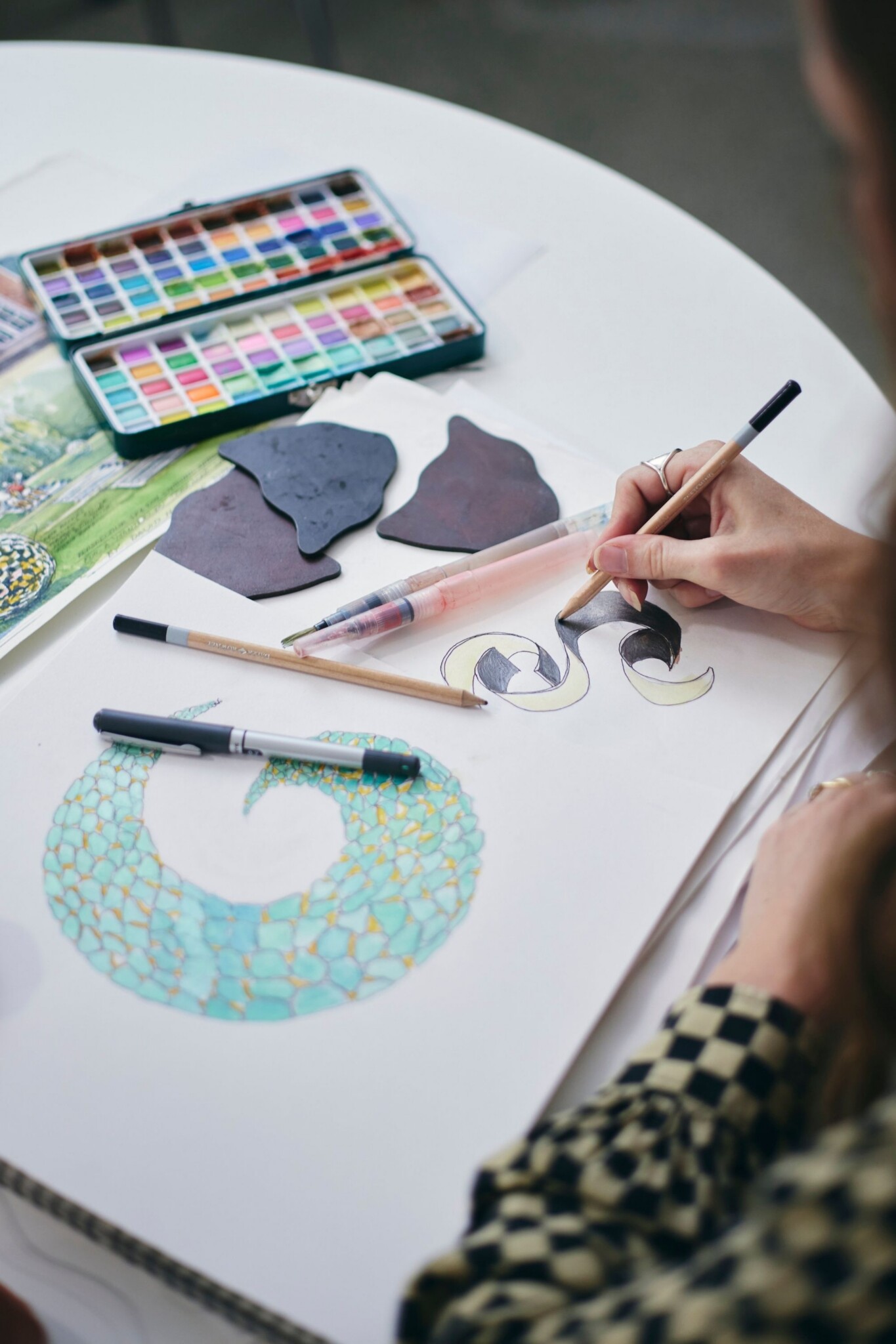 Matilda working on new designs at David Harber
