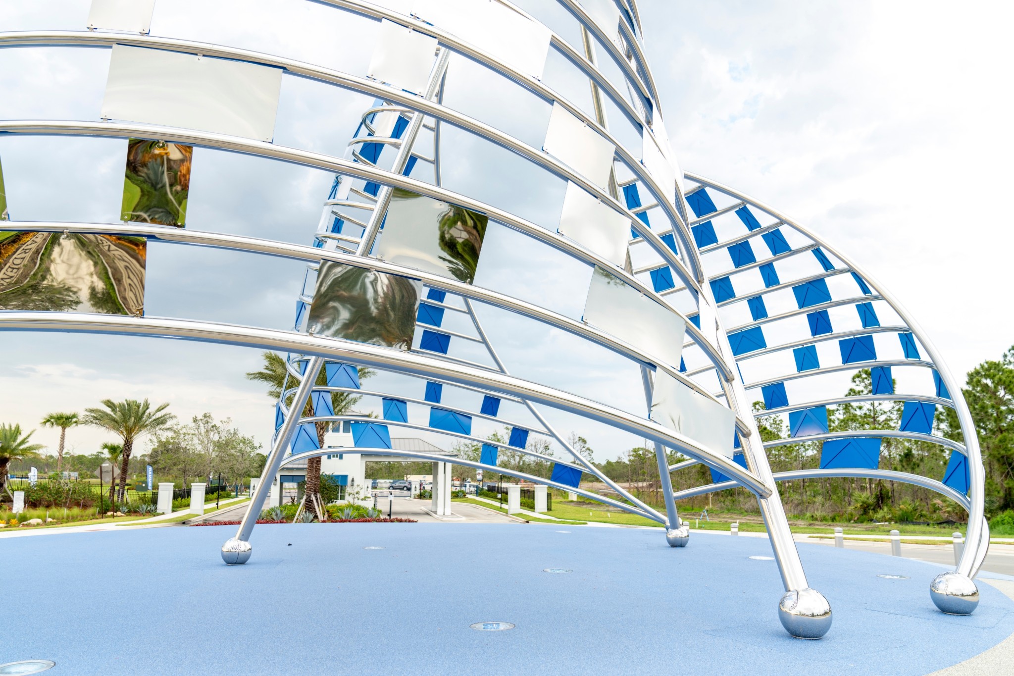 Close up of reflective marine-grade stainless steel panels in the sculpture's framework