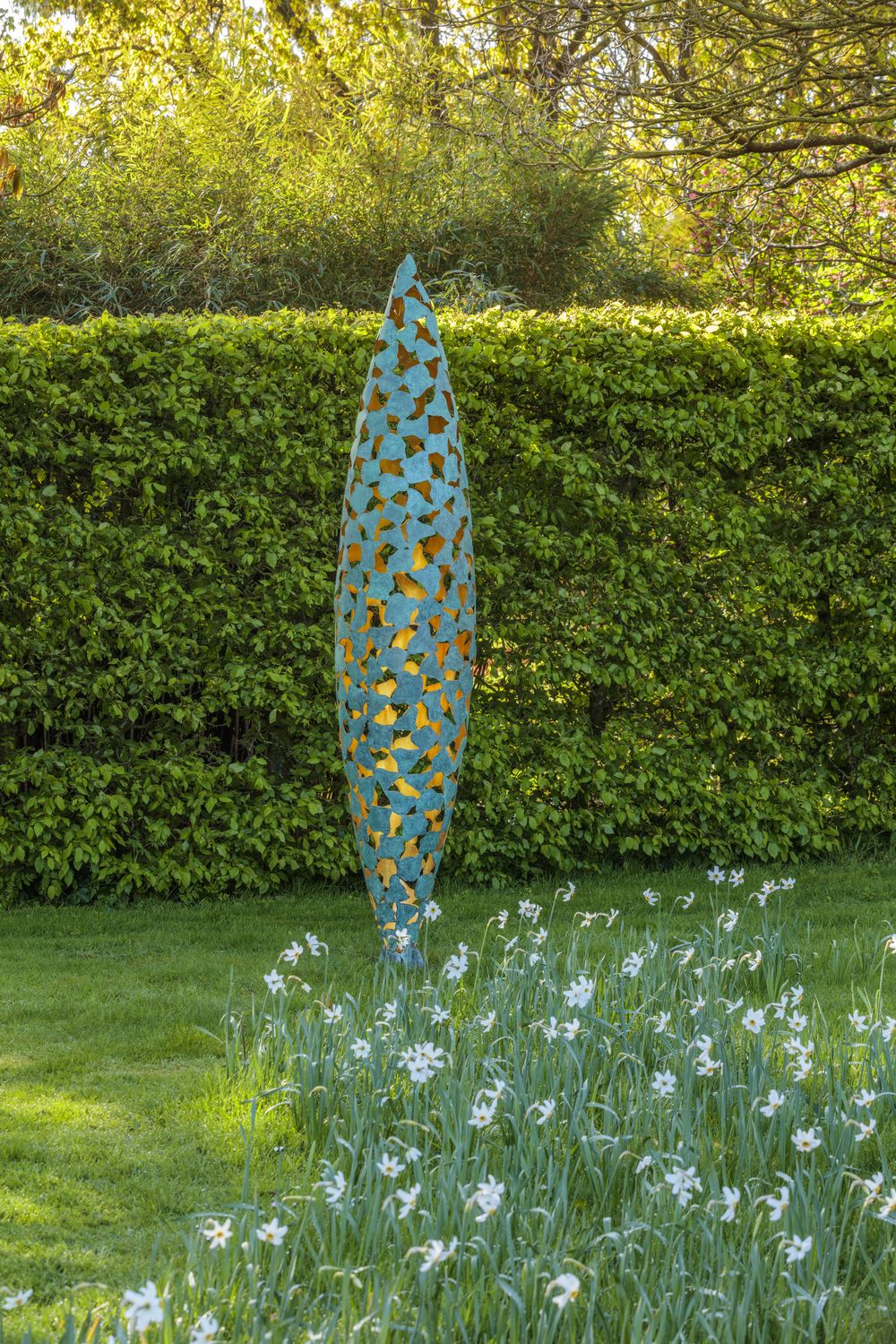 quill landscape sculpture in bronze and gold at the Helmingham Hall